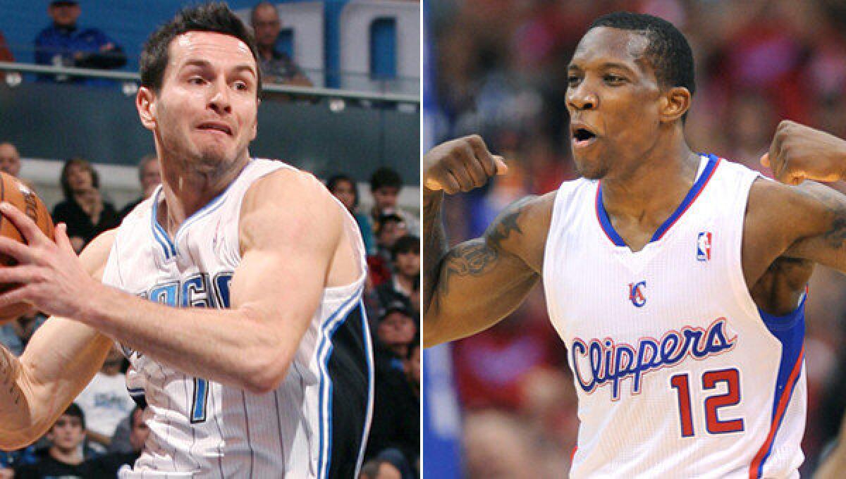 The Clippers acquired J.J. Redick, left, from the Milwaukee Bucks after sending Eric Bledsoe to the Phoenix Suns on Tuesday as part of a three-team trade.