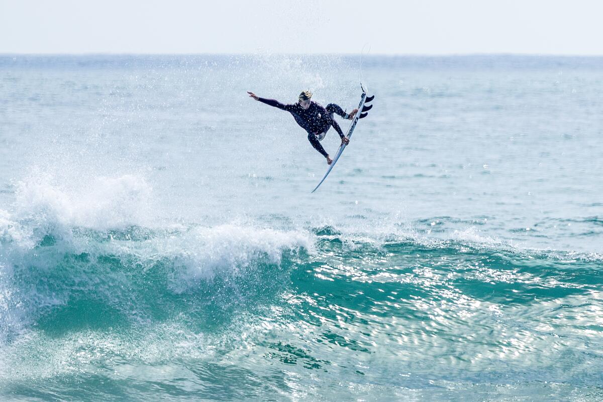  A surfer goes airborne at Lower Trestles.