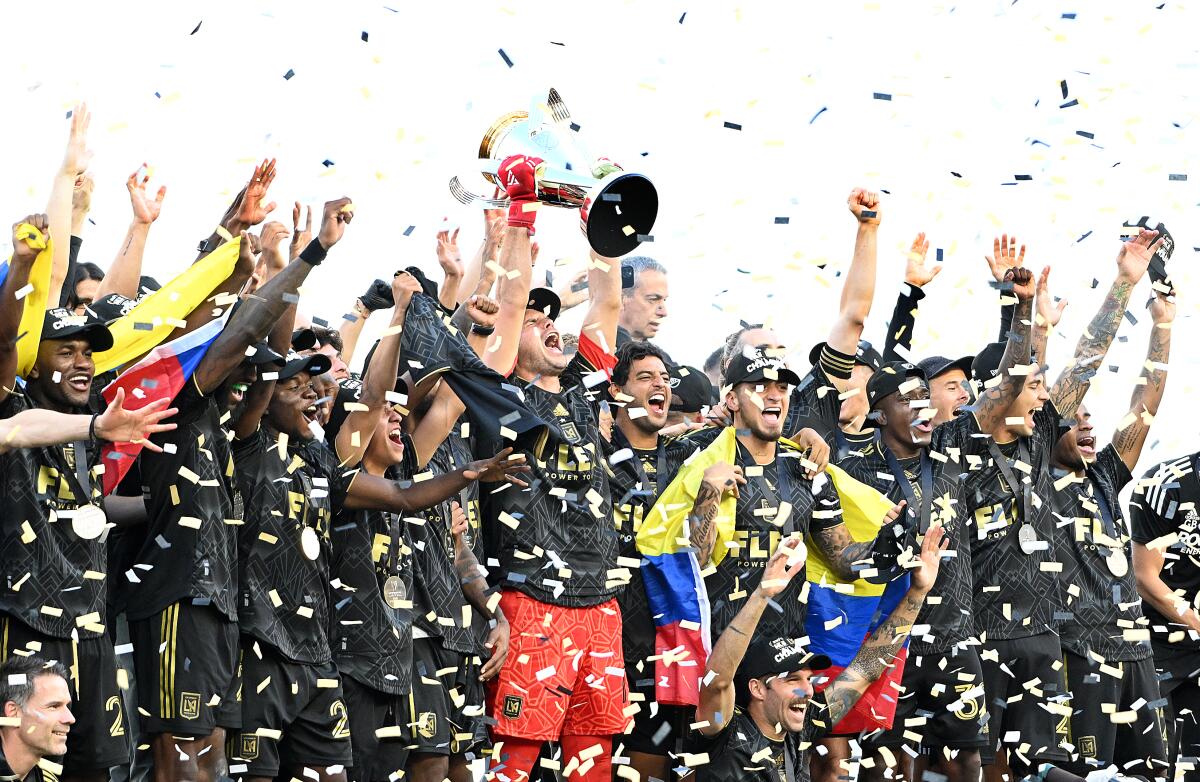 LAFC players celebrate the MLS Cup after defeating Philadelphia Union at Banc of California Stadium.