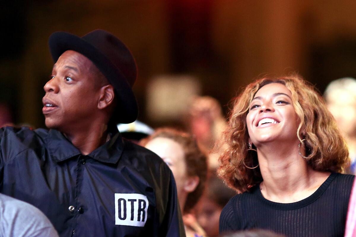 Beyonce, with Jay-Z, shows off her new hairstyle at the 2014 Budweiser Made in America Festival at Los Angeles Grand Park.