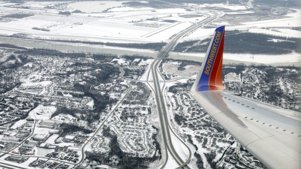 A Southwest Airlines plane approaches St. Louis' Lambert International Airport in January 2014.
