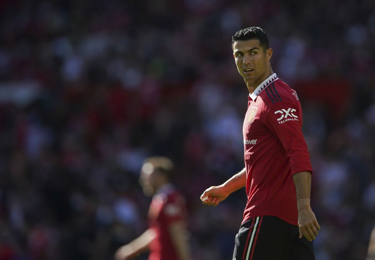 Manchester United's Cristiano Ronaldo looks on, during a pre-season friendly match between Manchester United and Rayo Vallecano, at Old Trafford, Manchester, Sunday July 31, 2022. (Dave Thompson/PA via AP)