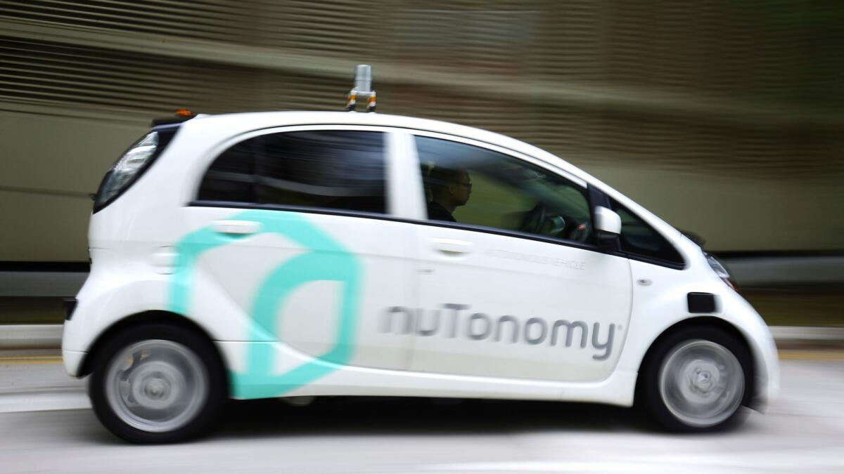 A self-driving vehicle using NuTonomy technology during a test drive in Singapore in 2016.
