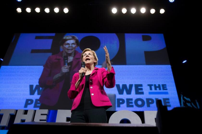 Mandatory Credit: Photo by MICHAEL REYNOLDS/EPA-EFE/REX (10184096ac) Presidential hopeful and Democratic Senator from Massachusetts Elizabeth Warren speaks at the We The People Summit, at Warner Theater in Washington, DC, USA, 01 April 2019. The summit has eight participants that have announced campaigns to be the 2020 Democratic nominee for US President. We The People Summit in Washington DC, USA - 01 Apr 2019