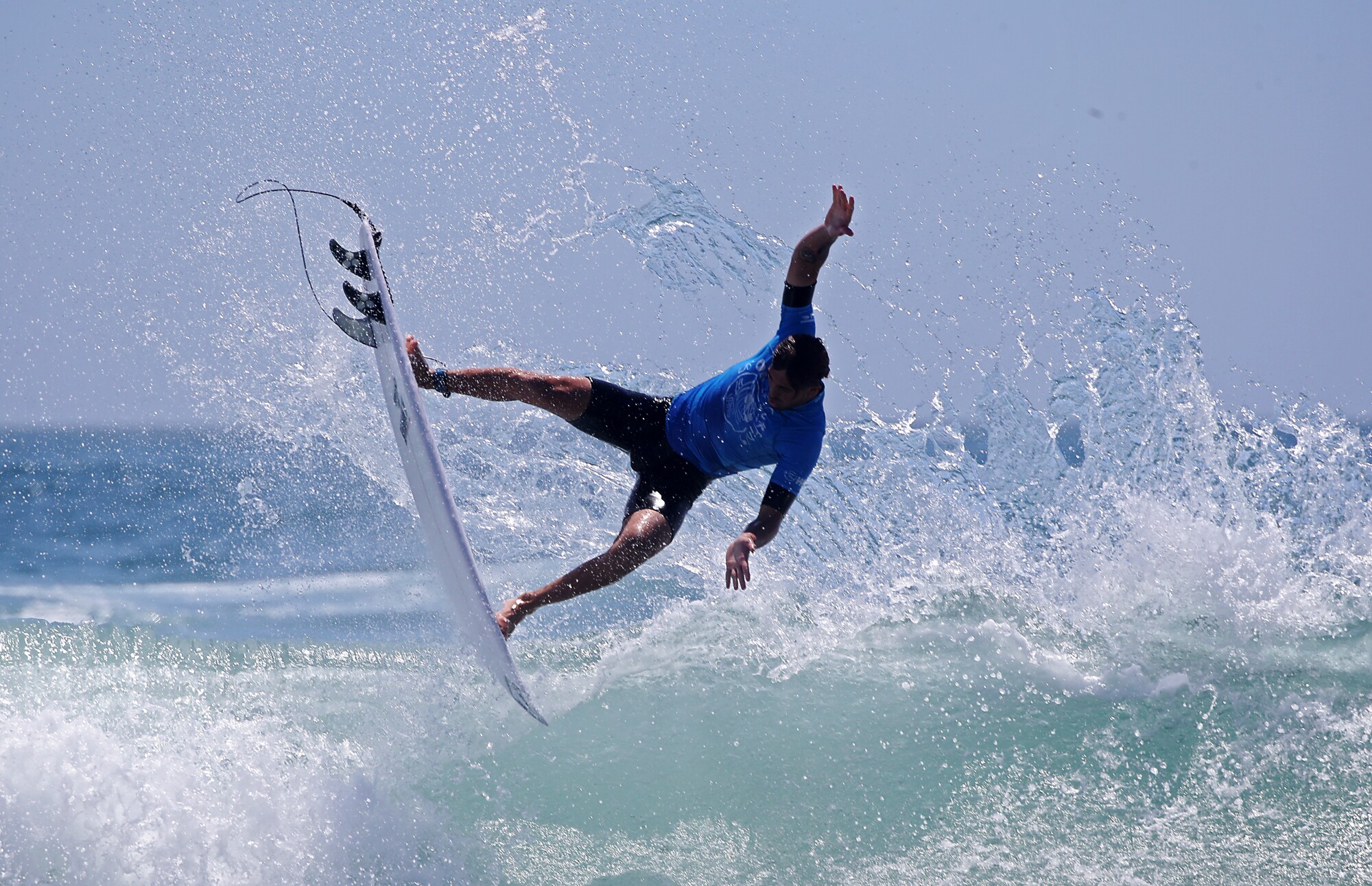 Joao Chianca of Brazil gets airborne during the Finals of the U.S. Open of Surfing.