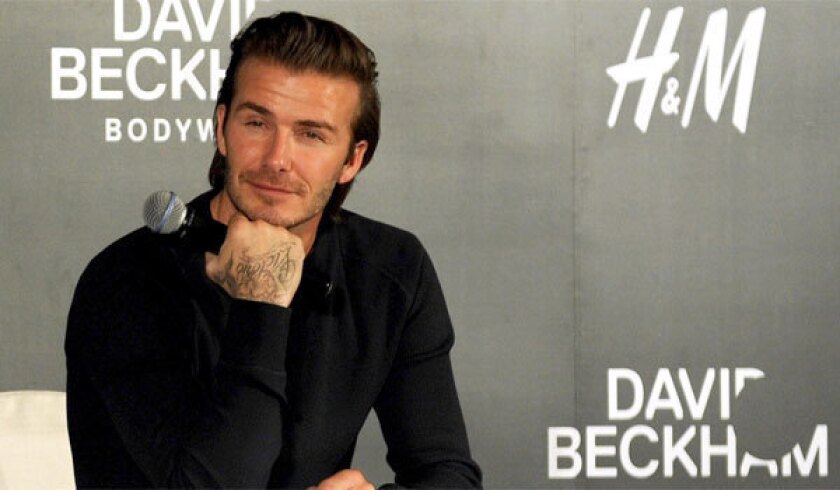David Beckham attends an H&M; promotional event at Shangri-La Hotel on Nov. 21 in Shanghai.