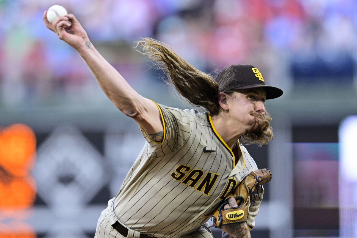 San Diego Padres starting pitcher Mike Clevinger throws against the Phillies 