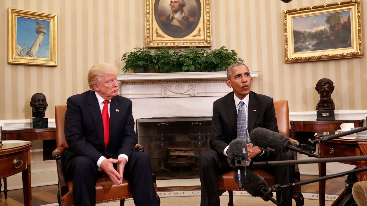 President Barack Obama meets with President-elect Donald Trump in the Oval Office of the White House in Washington.