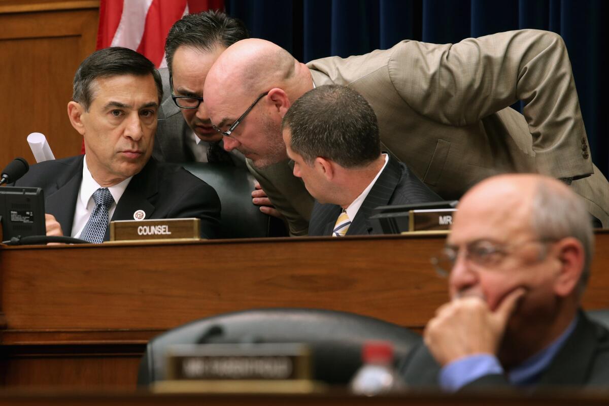 Rep. Darrell Issa, left: The hunt for scapegoats never ends.