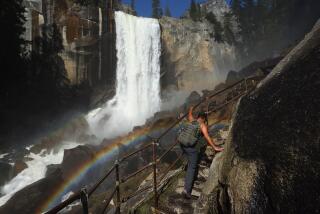 YOSEMITE NATIONAL PARK, CALIFORNIA - APRIL 28: A person climbs a stairway leading to the top of Vernal Fall, with a rainbow visible, as warming temperatures have increased snowpack runoff, on April 28, 2023 in Yosemite National Park, California. Most of Yosemite Valley will close this evening until May 3rd because of forecasted flooding from melting snowpack and extended high temperatures. As of April 1, snowpack in the Tuolumne River basin of Yosemite National Park was 244% of average amid record snowpack levels for some parts of California after years of drought. (Photo by Mario Tama/Getty Images)