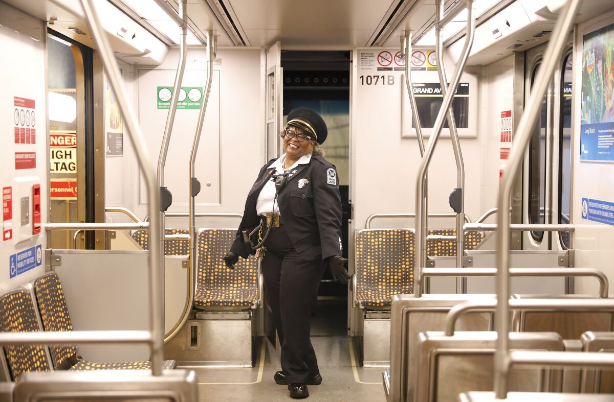 Subway train driver Glenda Murrell, who has worked for Metro since 1997, operates trains while the metro is in service. "sneak a peek" get on.