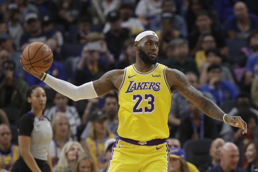 Los Angeles Lakers forward LeBron James (23) against the Golden State Warriors during a preseason NBA basketball game in San Francisco, Saturday, Oct. 5, 2019. (AP Photo/Jeff Chiu)
