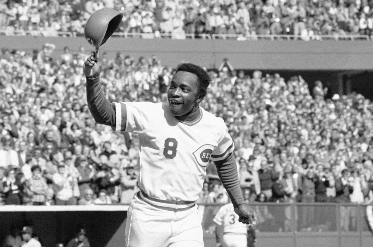 Cincinnati second baseman Joe Morgan tips his helmet to the fans as he rounds the bases after a homer in the first inning.