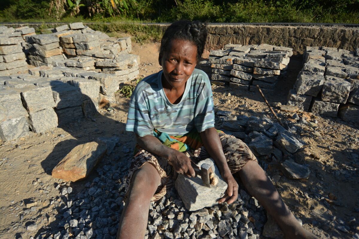 “The more protected the forest is, the harder life has become,” says Madeleine, 59, who like many here has one name. After the government protected the local forest, she can't cut trees to burn charcoal, so all day she breaks rocks to make gravel.
