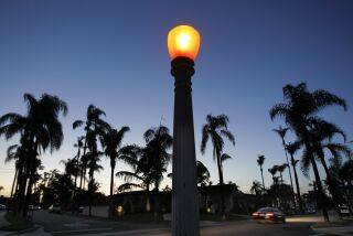 One of the antique street lights at the intersection of Kensington Drive and East Canterbury Drive in the Kensington neighborhood of San Diego on Wednesday.