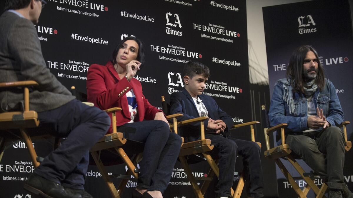 LA Times movie reporter Mark Olsen, from left, discusses "Capernaum" with director Nadine Labaki, actor Zain Al Rafeea and producer Khaled Mouzanar at an Envelope Live screening of at the Montalbán.