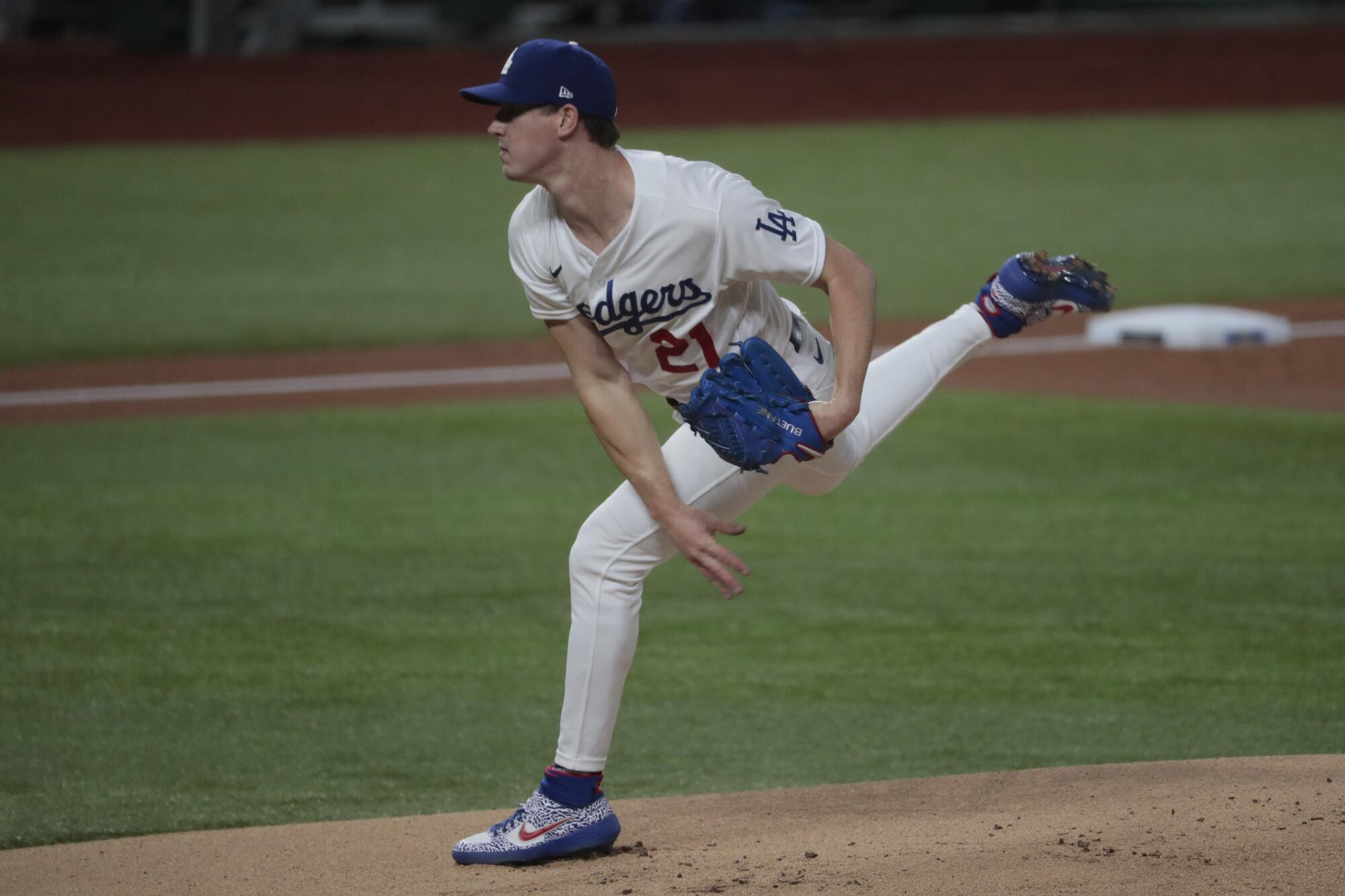 Dodgers starting pitcher Walker Buehler delivers in the first inning against the Atlanta Braves in Game 1 of the NLCS.
