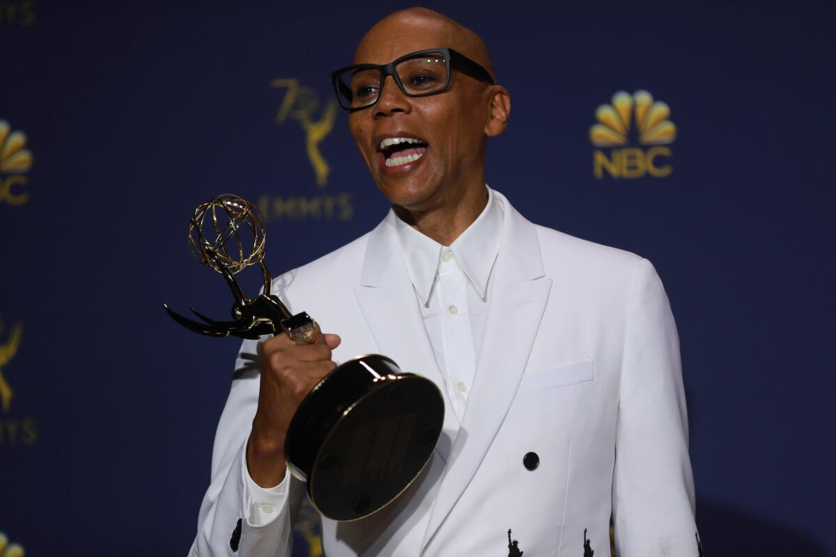 RuPaul speaking backstage at the Emmys after the first reality competition win for "RuPaul's Drag Race."
