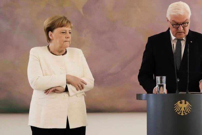 German Chancellor Angela Merkel attends a ceremony where the country's new Justice Minister was given her certificate of appointment by German President Frank-Walter Steinmeier at the presidential Bellevue Palace in Berlin on June 27, 2019. - During the ceremony, Merkel suffered a new shaking spell, just one week after sparking concerns by visibly trembling at another official ceremony. (Photo by Kay Nietfeld / dpa / AFP) / Germany OUTKAY NIETFELD/AFP/Getty Images ** OUTS - ELSENT, FPG, CM - OUTS * NM, PH, VA if sourced by CT, LA or MoD **
