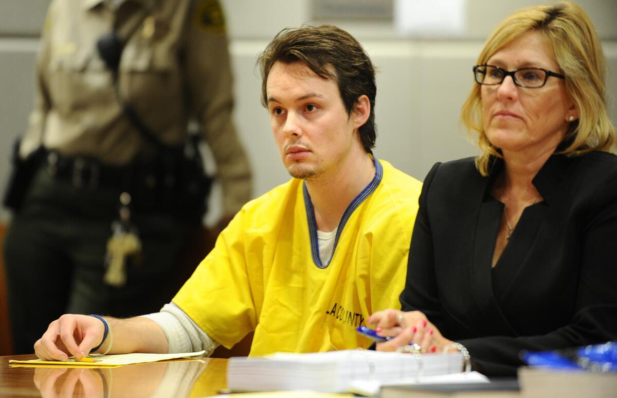 Murder suspect Alexander McDonald listens to court proceedings during a preliminary hearing at the Airport Courthouse Tuesday.