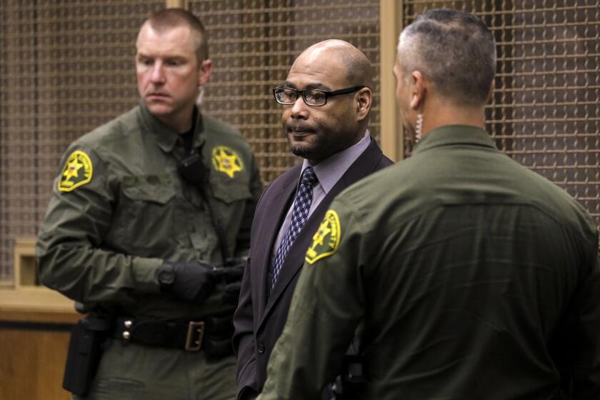 Newport Beach, CA - April 19: Jamon Buggs, accused of execution-style shootings of a man and woman, on his first day of trial in the court of Judge Gregg Prickett in Dept. H2, Harbor Justice Center on Tuesday, April 19, 2022 in Newport Beach, CA. (Irfan Khan / Los Angeles Times)