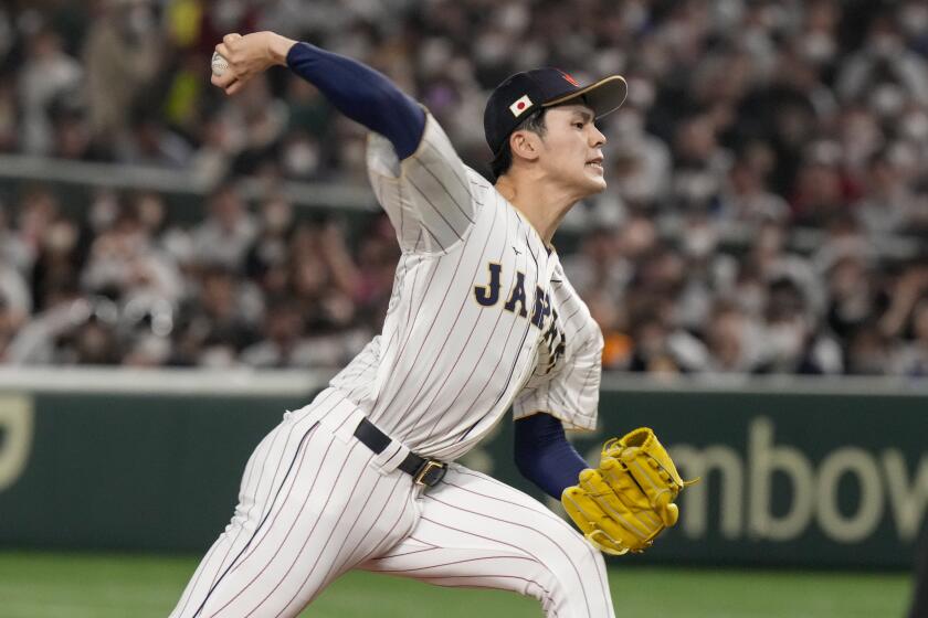 Roki Sasaki of Japan pitches during their Pool B game against the Czech Republic.