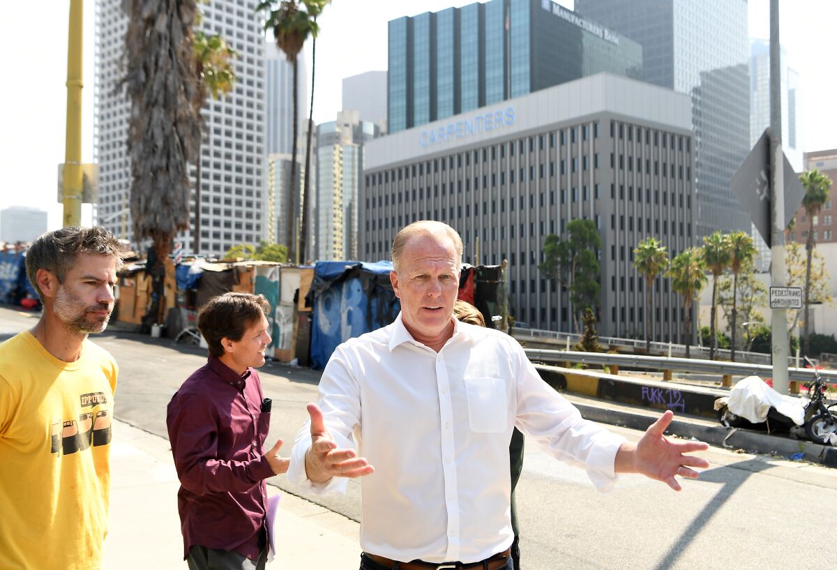 Faulconer speaks at a press conference near a homeless encampment in downtown Los Angeles