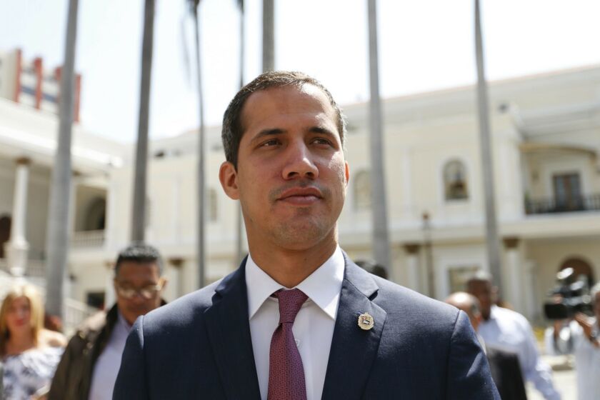 Venezuelan opposition leader Juan Guaido, who has declared himself interim president, arrives to the National Assembly for a meeting with "Frente Amplio," a coalition of opposition parties, and other civic groups in Caracas, Venezuela, Monday, March 18, 2019. President Nicolas Maduro has remained in power despite heavy pressure from the United States and other countries arrayed against him, managing to retain the loyalty of most of Venezuelas military leaders. (AP Photo/Natacha Pisarenko)