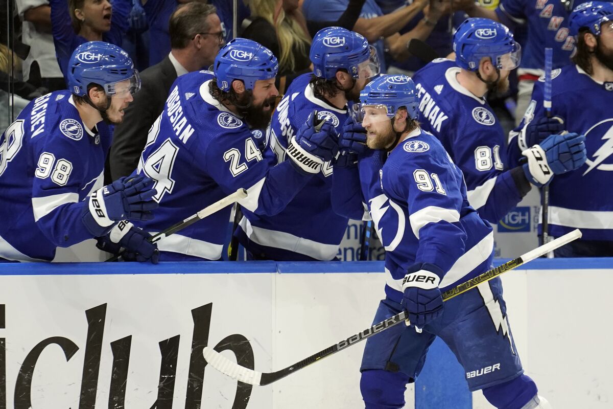 Tampa Bay Lightning forward Steven Stamkos celebrates with teammates after scoring a third-period goal against the Rangers.