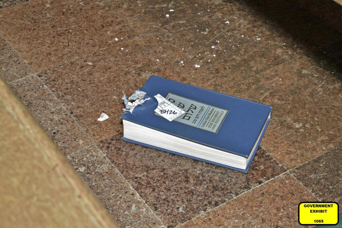 A bullet-damaged prayer book.