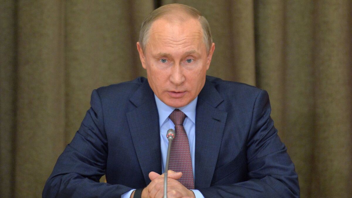 Russian President Vladimir Putin, shown Tuesday in Sochi, has signed a decree withdrawing support for the International Criminal Court.