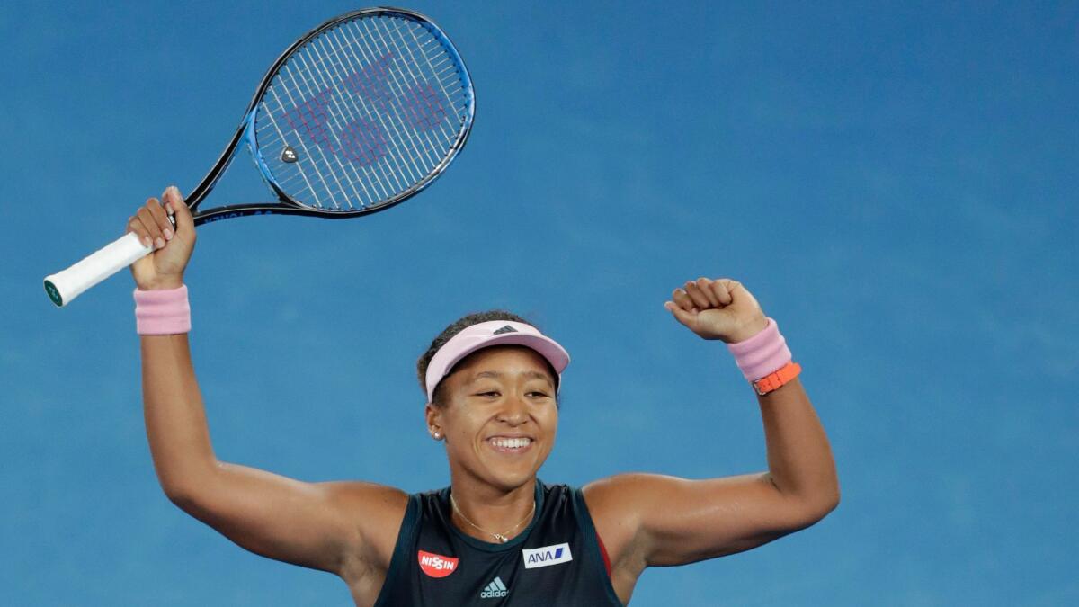 Naomi Osaka of Japan celebrates winning her women's singles semifinal match against Karolina Pliskova of Czech Republic at the Australian Open.