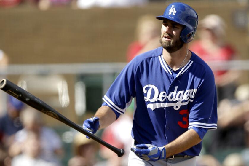 Scott Van Slyke, heading to first base after drawing a walk in an exhibition game, is likely to start in left field for the Dodgers when they open the regular season against the Diamondbacks in Australia next week.