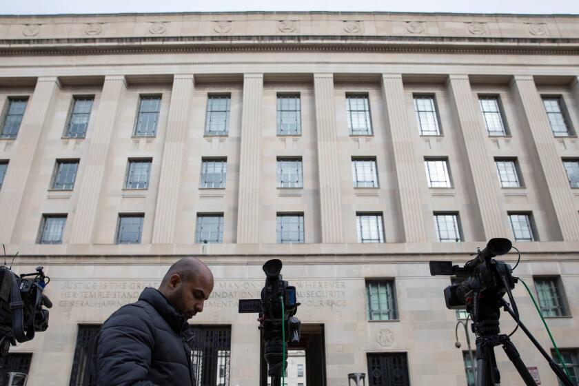 Mandatory Credit: Photo by ERIK S LESSER/EPA-EFE/REX (10165653b) Television news crews gather outside the US Department of Justice building in Washington, DC, USA, 24 March 2019. US Attorney General William Barr issued a summary of Special Counsel Robert Mueller's report on Russian interference in the 2016 election to key members of Congress, who in turn released the 'principal conclusions' of the report to the public. US Attorney General William Barr's summary of Special Counsel Robert Mueller's report on Russian interference in the 2016 election, in Washington, DC, USA - 24 Mar 2019 ** Usable by LA, CT and MoD ONLY **