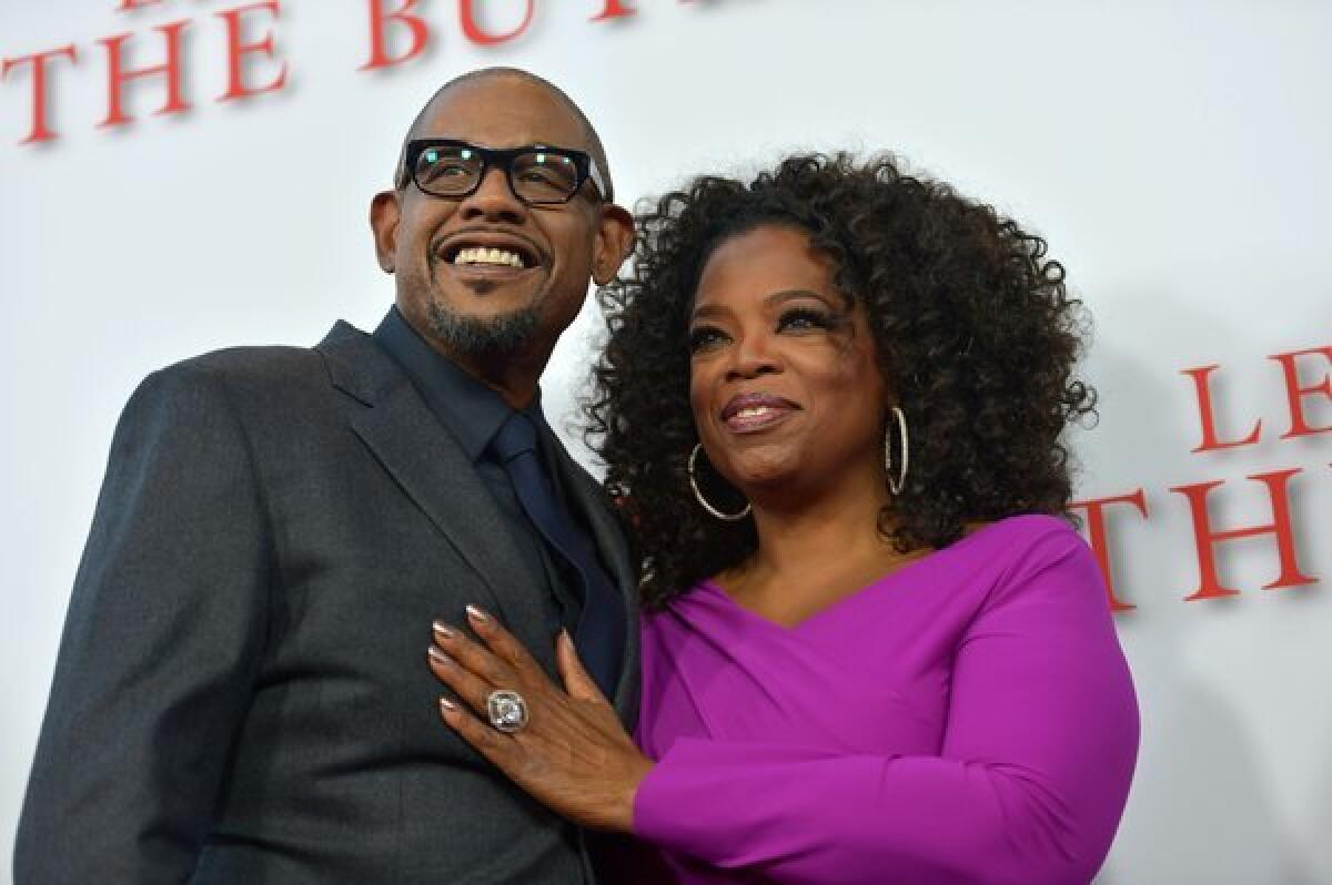 Oprah Winfrey with Forest Whitaker at "The Butler's" Los Angeles premiere