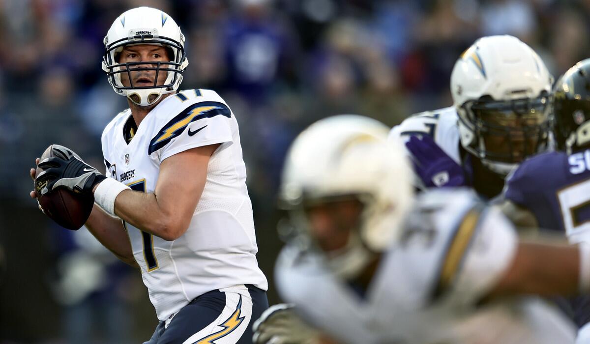 Chargers quarterback Philip Rivers (17) looks for a receiver in the first half of a 34-33 victory over the Ravens on Sunday in Baltimore.