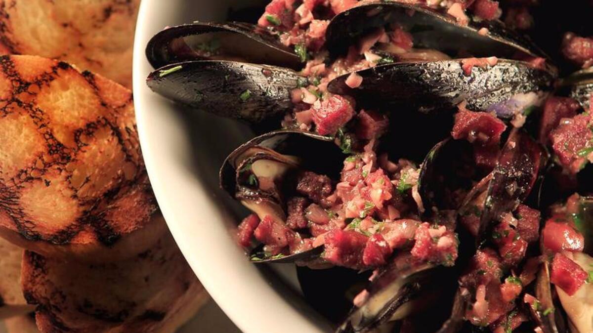 Hurley's grilled mussels with red wine and chorizo.