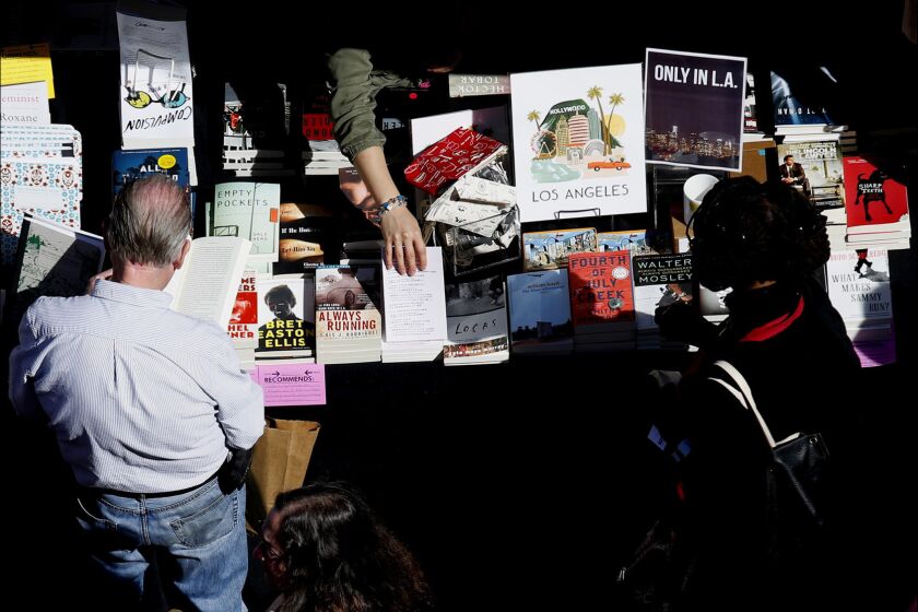 People browse books for sale at the Los Angeles Times Festival of Books at USC on April 19.