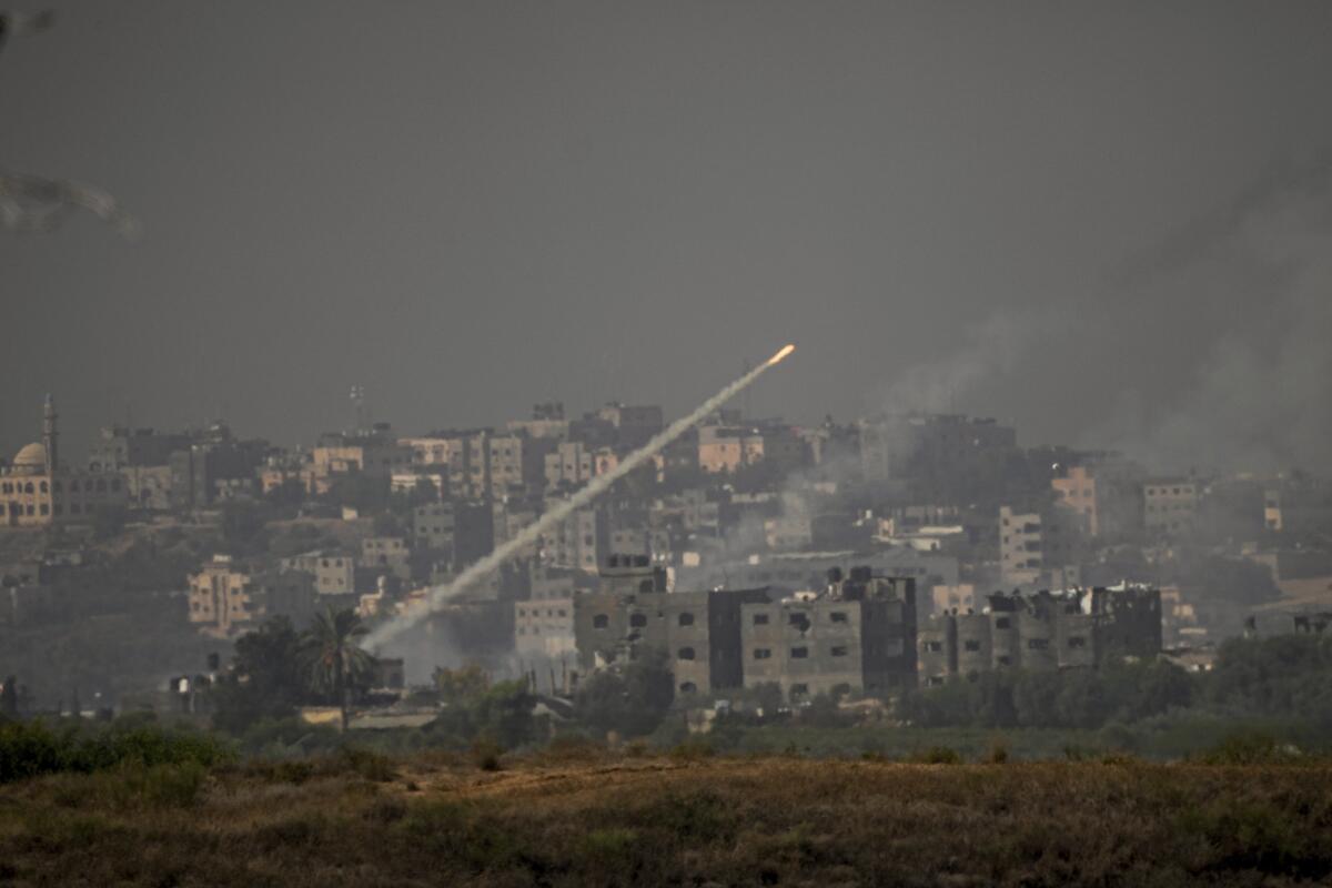 Rockets are fired toward Israel from the Gaza Strip, as seen from southern Israel, earlier this week.