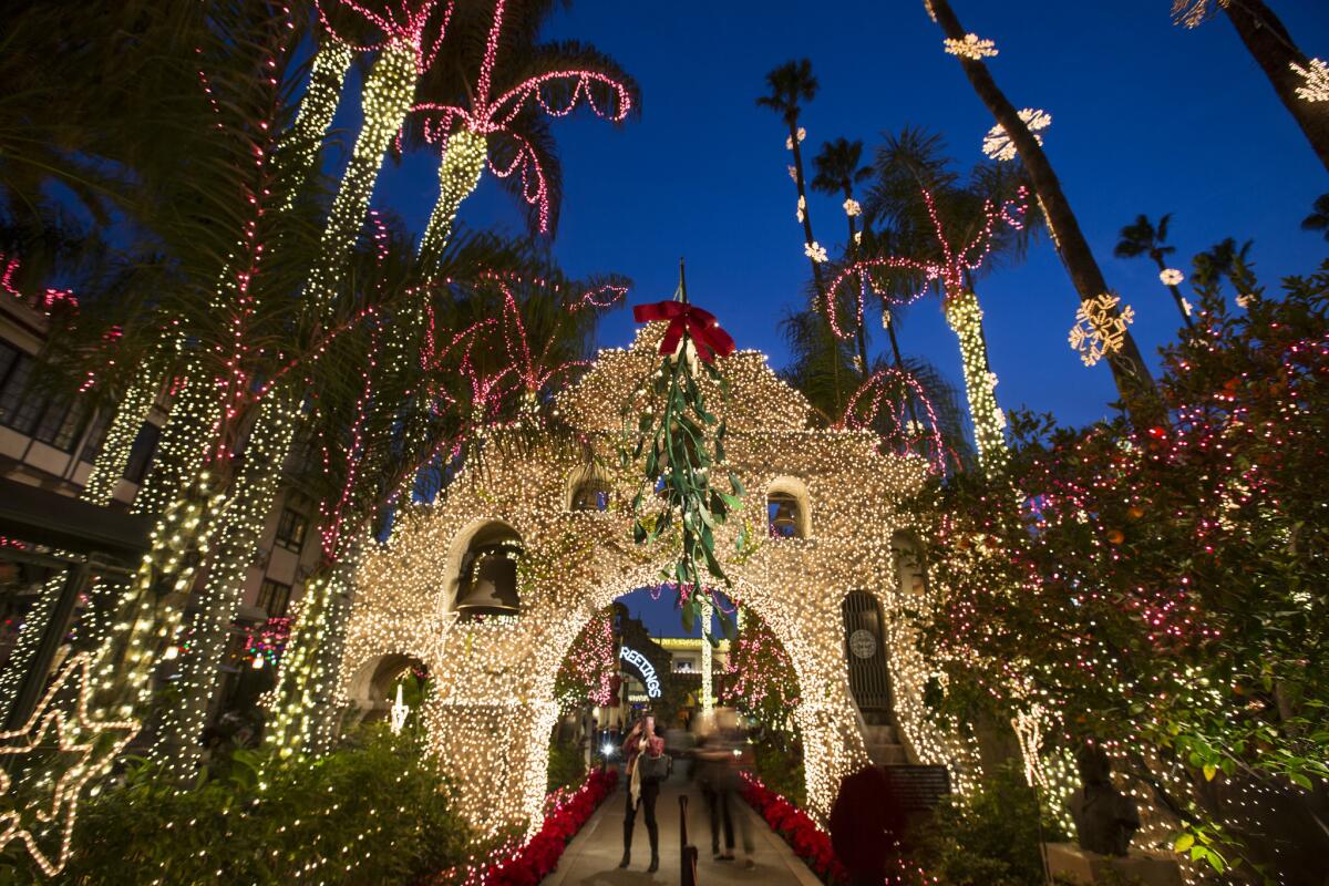 Bright holiday lights decorate the  Mission Inn in Riverside