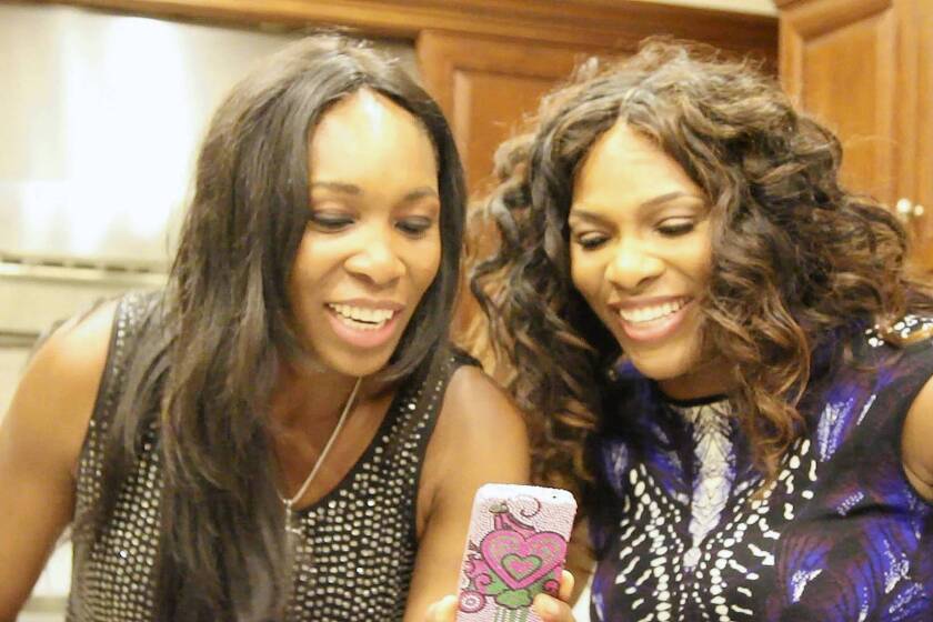 Venus, left, and Serena Williams in the movie documentary "Venus & Serena."