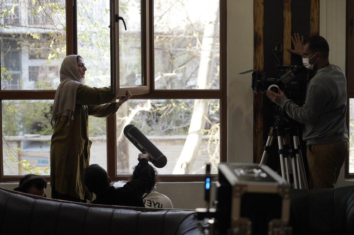The crew works on set for the Iranian short film "Snail."
