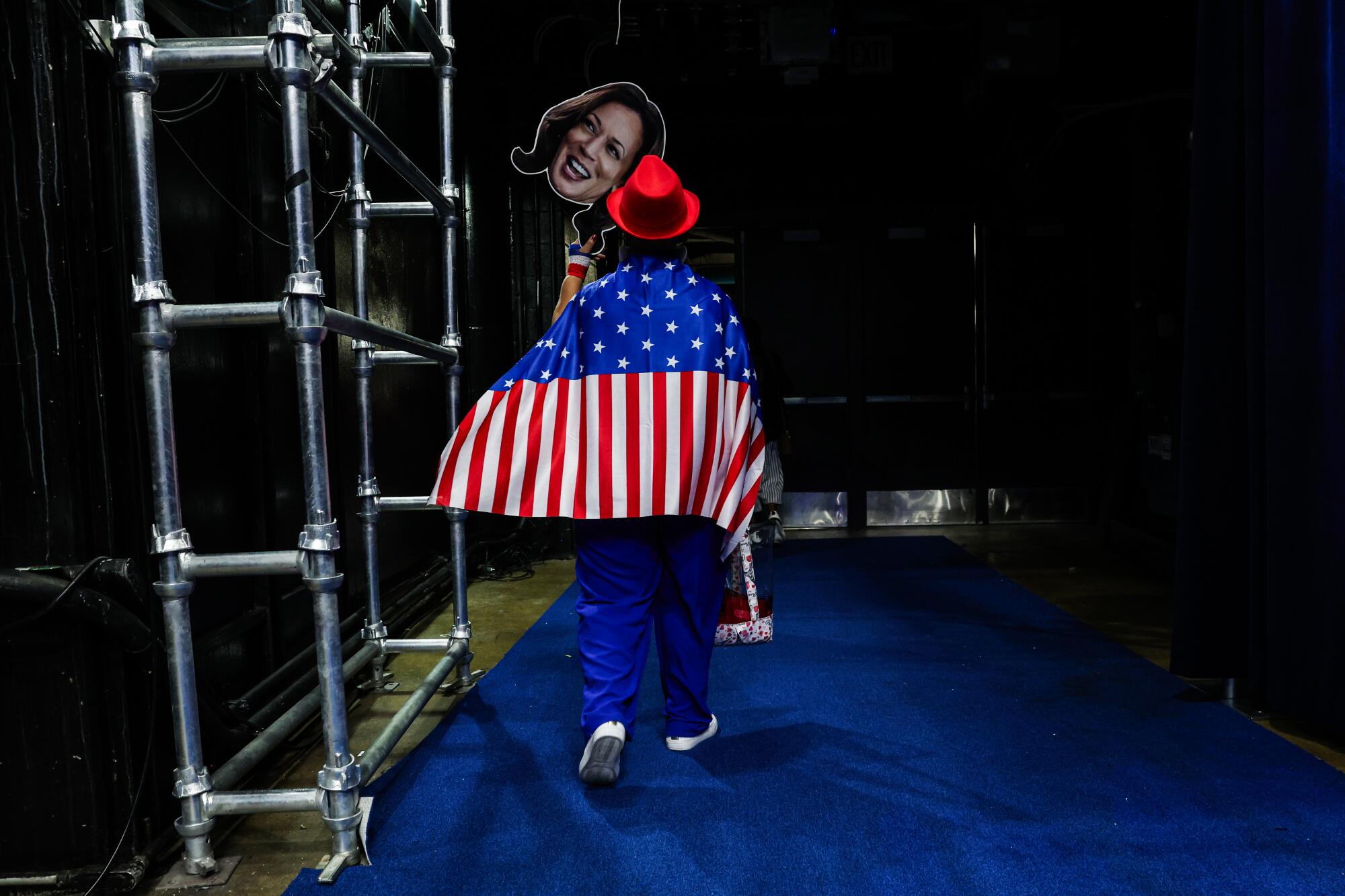 A Georgia delegate leaves the arena at the conclusion of day two of the Democratic National Convention.