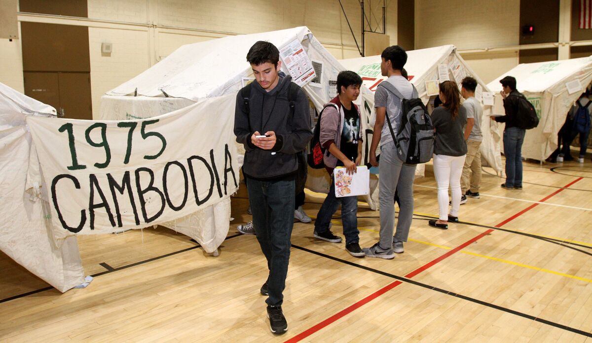 Glendale High School students had a chance to view tents with information about genocides provided to the school by I-ACT on Thursday, March 10, 2016. I-ACT provided six tents with information about genocides in Armenia 1915, Holocaust 1938, Cambodia 19075 and present-day Darfur.