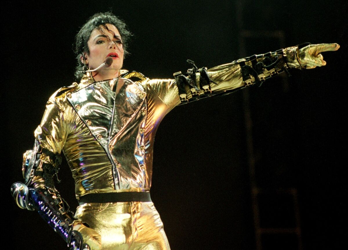 A flesh-and-blood Michael Jackson performs during his "HIStory" world tour concert at Ericsson Stadium Nov. 10, 1996, in Auckland, New Zealand.