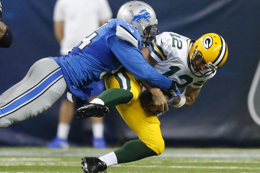 Lions defensive end Ezekiel Ansah has been a menace to quarterbacks this season, as Green Bay's Aaron Rodgers can attest.