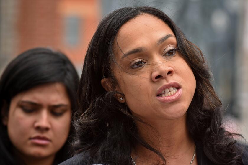 Baltimore State's Attorney Marilyn Mosby held a news conference Wednesday at Mount and Presbury Streets, the corner where Freddie Gray was taken into police custody, after dropping the charges against the three remaining officers to be tried in his death.