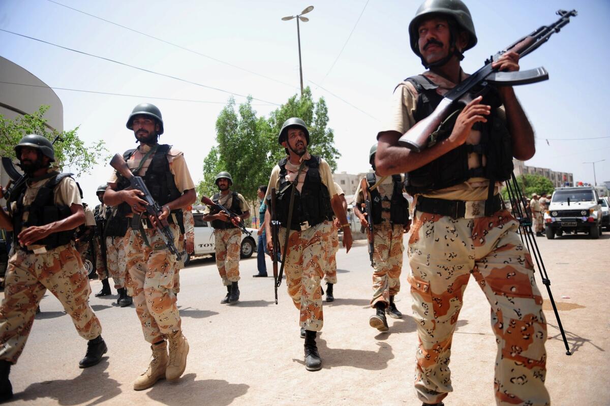 Pakistani rangers take part in a search operation after the second attack this week on the airport in Karachi.