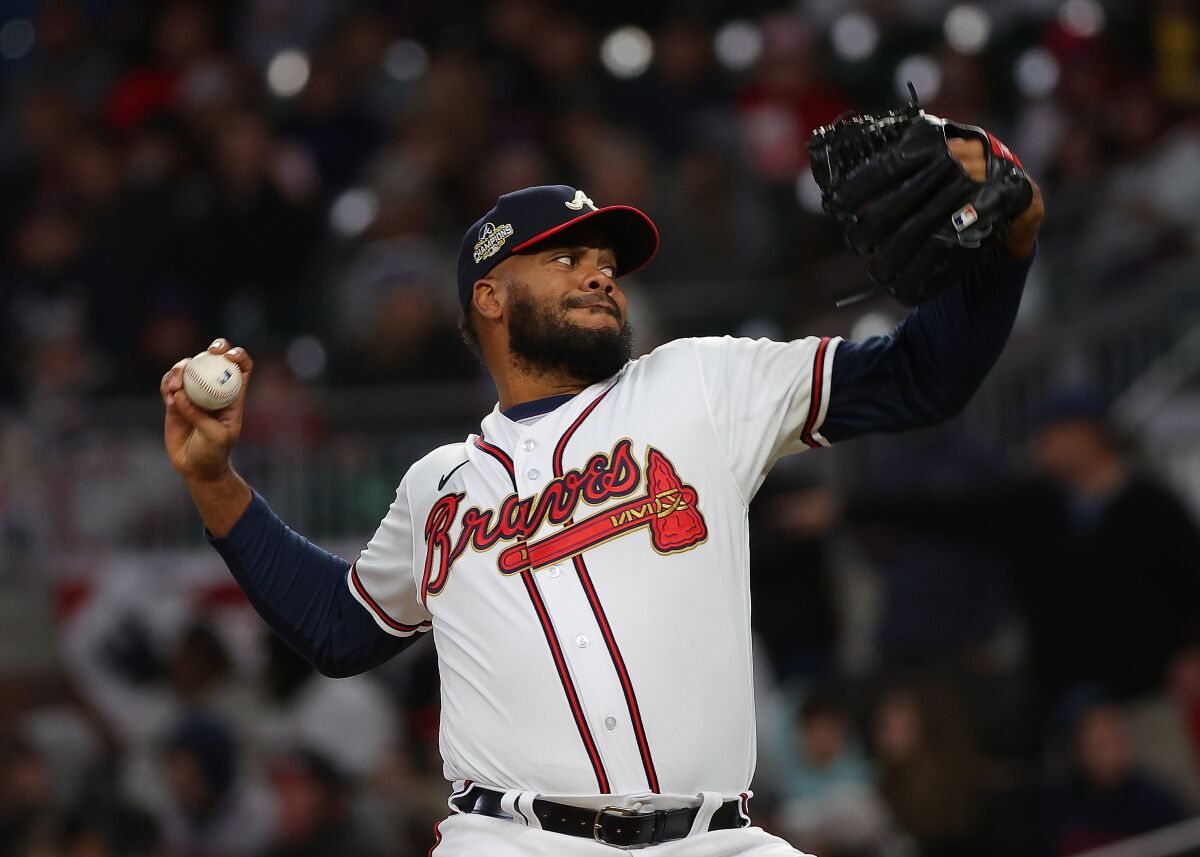 Atlanta Braves reliever Kenley Jansen pitches against the Cincinnati Reds on Friday. 