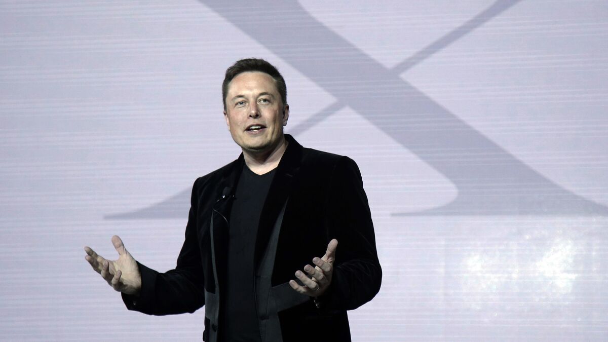 Tesla Motors CEO Elon Musk, seen here at the September 2015 introduction of the Model X "falcon-wing" SUV, addressed shareholders in Mountain View, Calif.